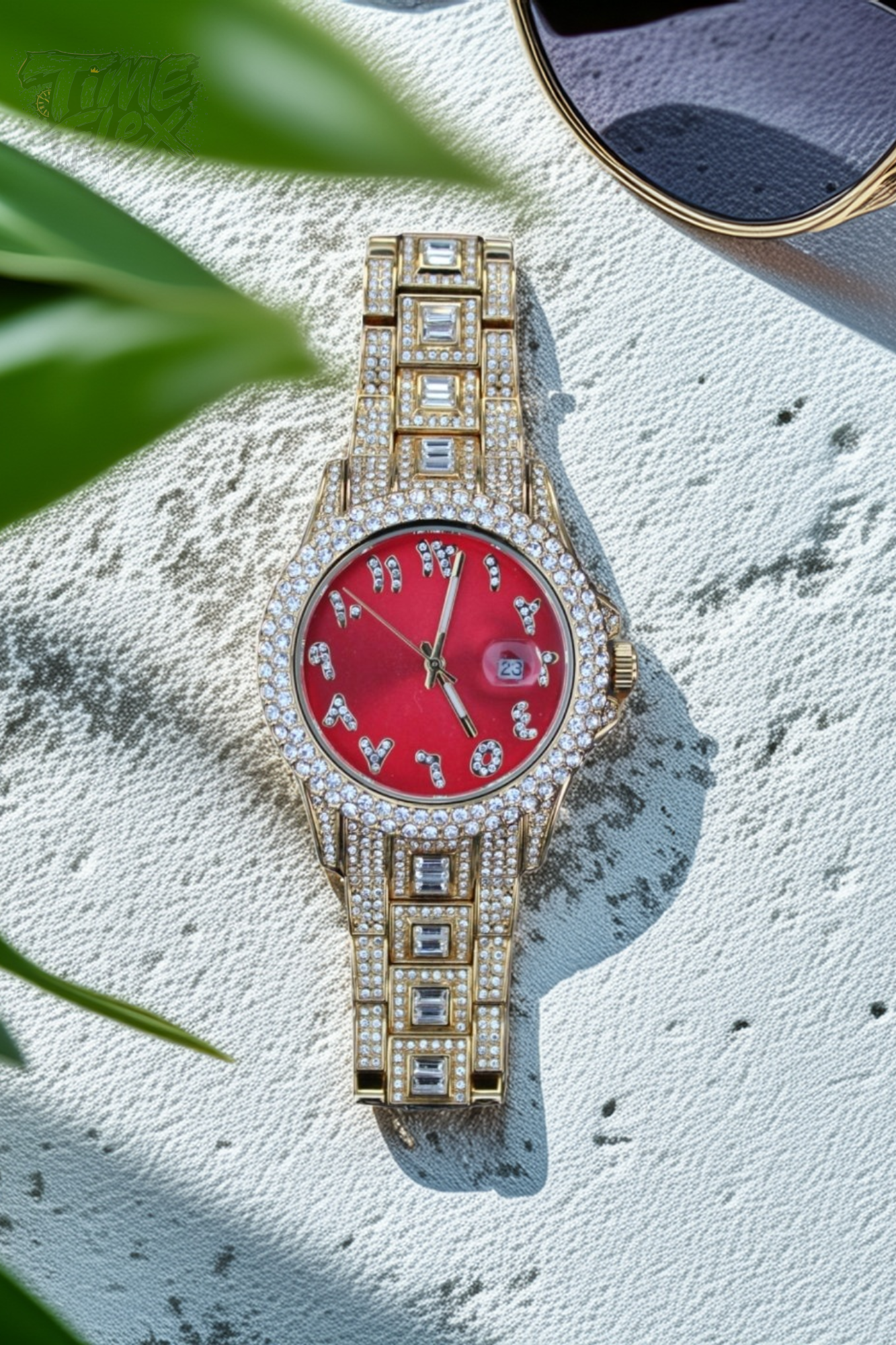 Gold-tone unisex watch with a red dial, crystal-encrusted bezel, and rectangular stones on the band. The watch features sparkling Roman numeral markers and a date display, offering a luxurious and eye-catching design.
