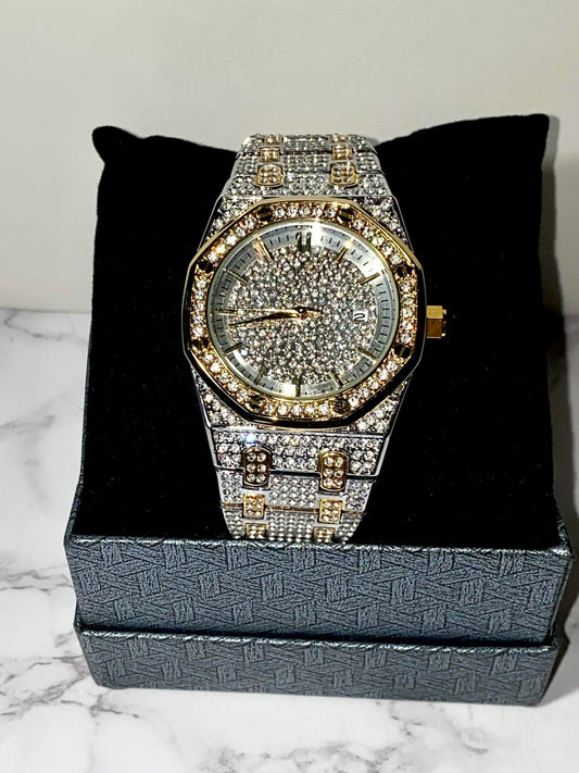 Two-tone silver and gold men's and women's watch with a diamond-studded dial and bezel. The watch features a sparkling design with crystal-encrusted links on the band, offering a luxurious, eye-catching appearance.