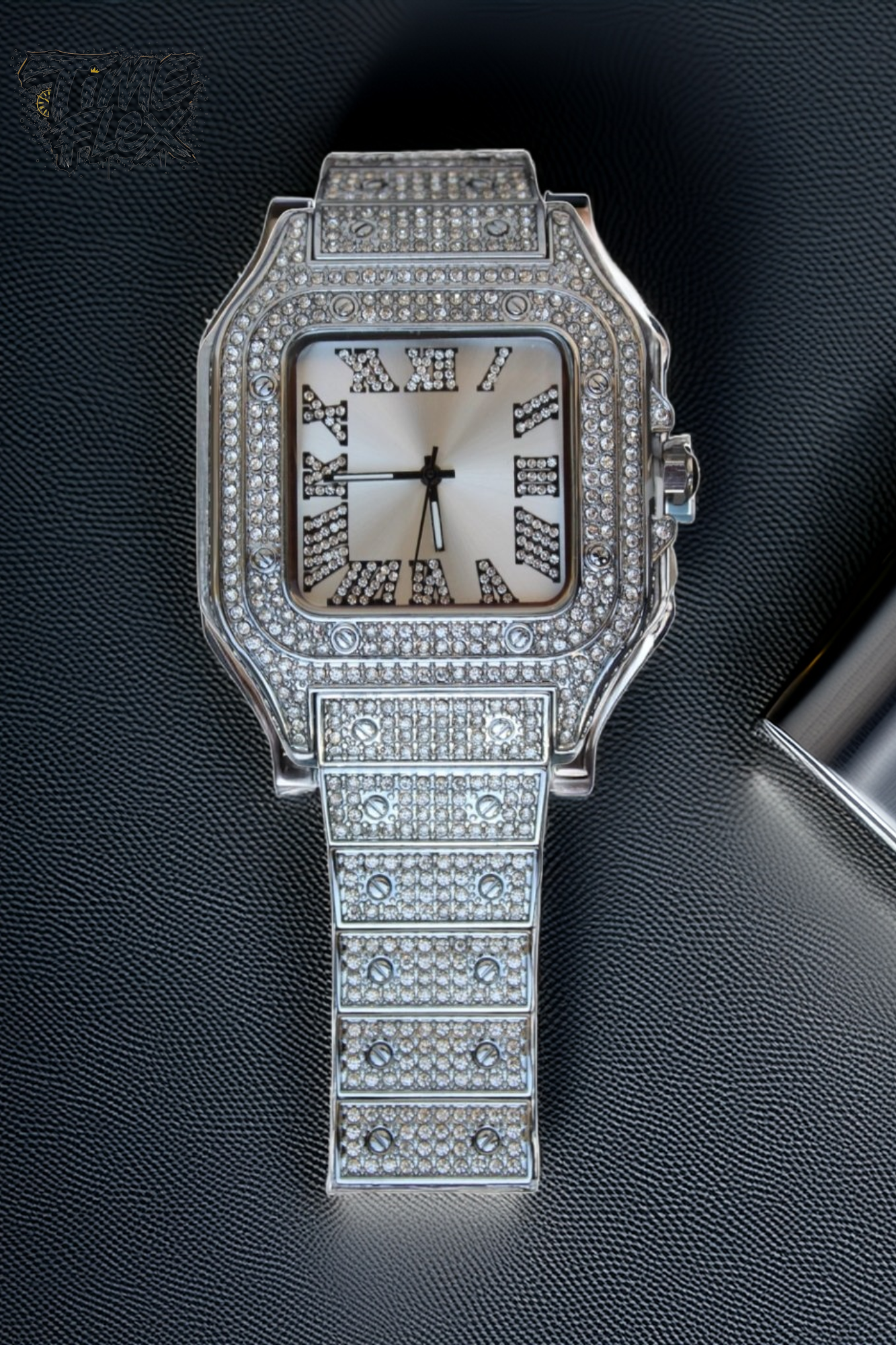 Silver-tone unisex watch with a square dial, crystal-encrusted bezel, and sparkling band. The watch features Roman numeral markers and a luxurious, diamond-studded design, offering a sleek and elegant look.