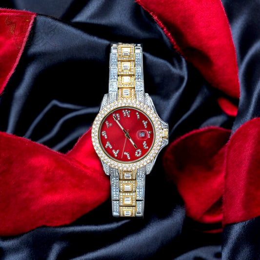 Two-tone silver and gold men's and women's watch with a red dial and diamond-studded bezel. The watch features crystal-encrusted Roman numerals, a date display at the 3 o'clock position, and a luxurious, sparkling band with rectangular stones.