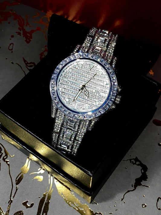 Silver iced-out watch with grid pavé dial, baguette bezel, and diamond bracelet – luxury streetwear timepiece