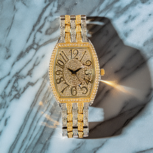 Barrel-shaped gold iced watch with oversized numbers and two-tone bracelet – vintage luxury style