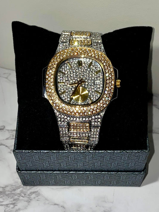 Two-tone iced-out watch with gold bezel accents, diamond pavé dial, and gold subdial – luxury streetwear style