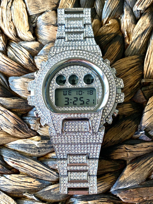 Silver iced-out digital watch with full pavé bezel and bracelet – luxury tech streetwear style