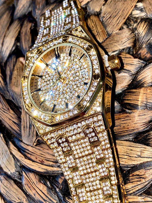 Gold iced-out octagon watch with pavé dial, classic markers, and diamond bracelet – luxury streetwear timepiece