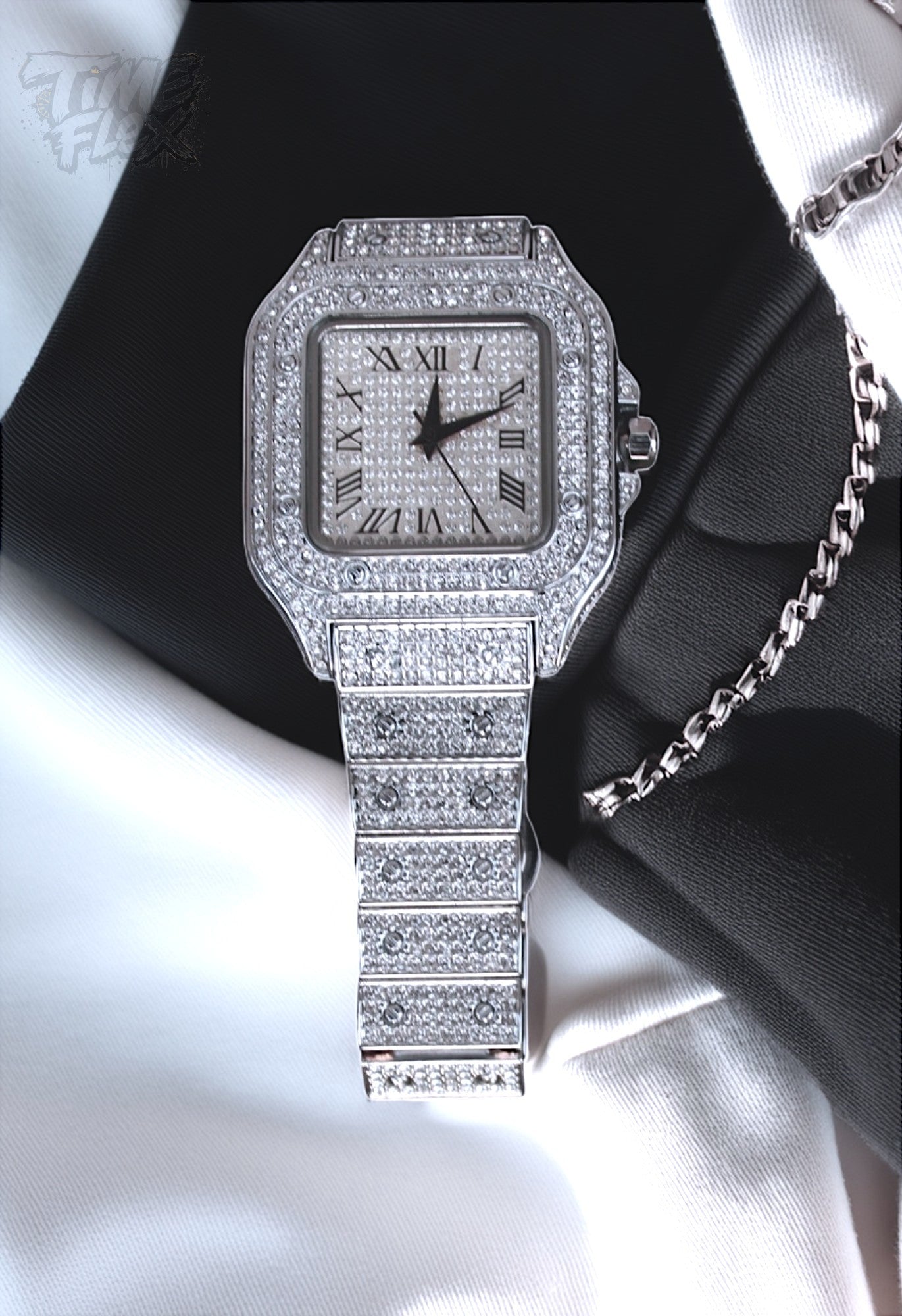Silver-tone unisex watch with a square dial, crystal-encrusted bezel, and sparkling band. The watch features Roman numeral markers and a luxurious, diamond-studded design, offering a sleek and elegant look.