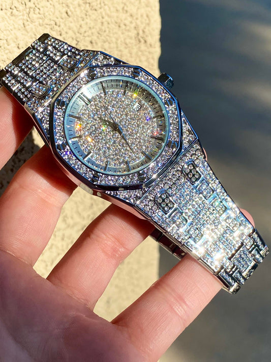 Silver iced-out octagon watch with pavé dial, classic markers, and diamond bracelet – luxury streetwear timepiece