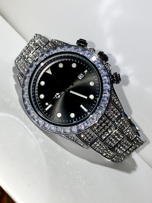 Silver iced chronograph watch with black dial displayed on white ceramic cuff – ShadowFlex 42MM by Time Flex