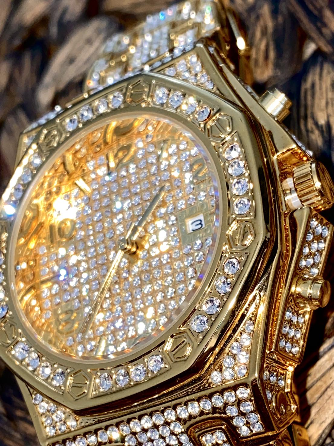 Gold iced-out octagon watch with pavé dial, gold markers, and diamond bracelet – luxury streetwear timepiece