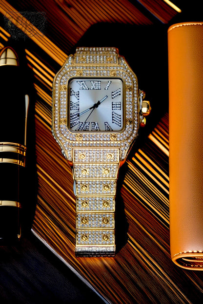 Gold-tone unisex watch with a square dial, diamond-studded bezel, and Roman numeral markers. The watch features a luxurious crystal-encrusted band, offering a sparkling and elegant design.