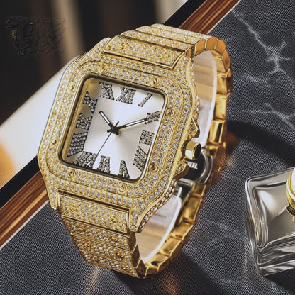 Gold-tone unisex watch with a square dial, diamond-studded bezel, and Roman numeral markers. The watch features a luxurious crystal-encrusted band, offering a sparkling and elegant design.