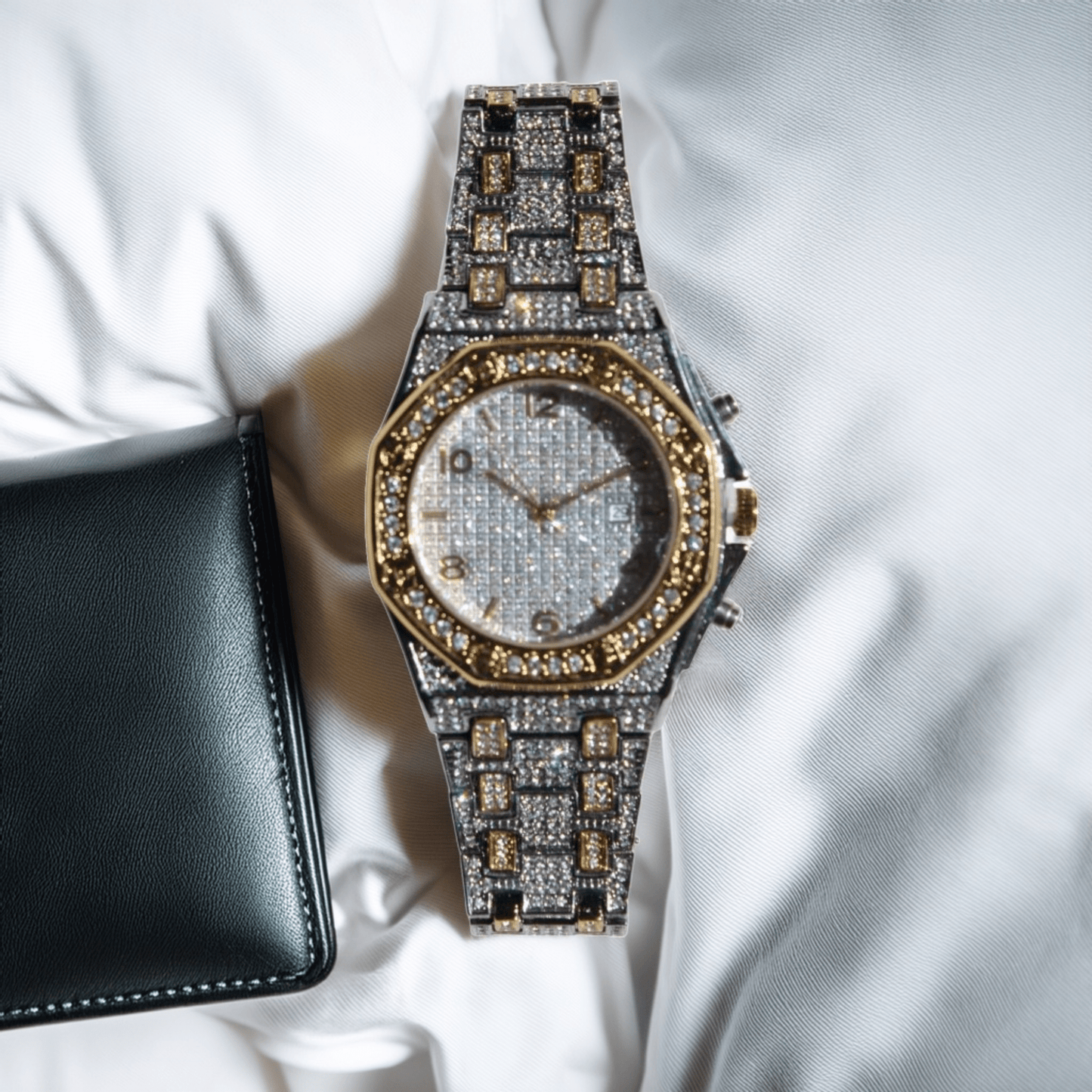 Iced-out two-tone watch with gold hex bezel, silver pavé dial, and chronograph details – urban luxury timepiece