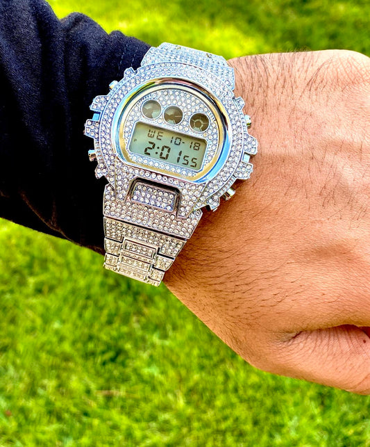 Silver iced-out digital watch with full pavé bezel and bracelet – luxury tech streetwear style