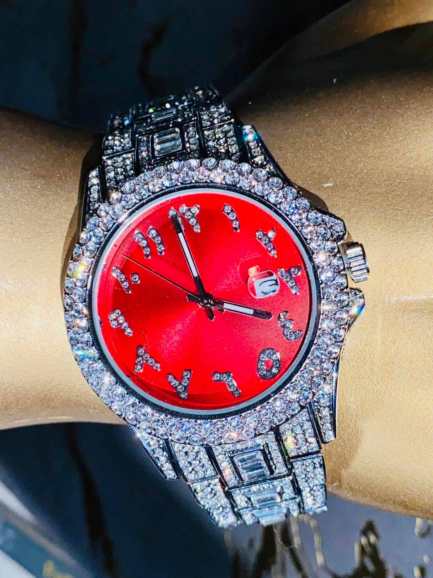 Silver iced-out watch with scarlet red dial, crystal markers, and baguette bracelet – luxury streetwear timepiece
