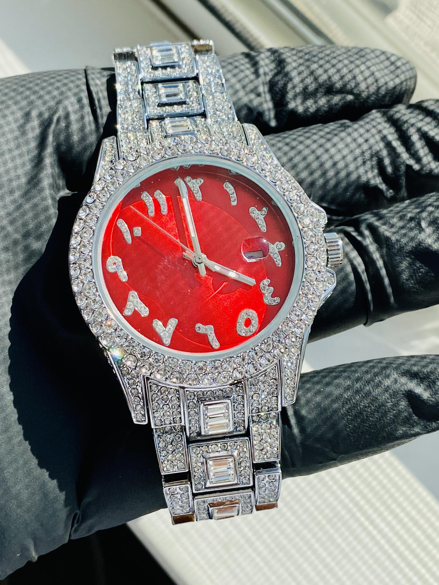Silver iced-out watch with scarlet red dial, crystal markers, and baguette bracelet – luxury streetwear timepiece
