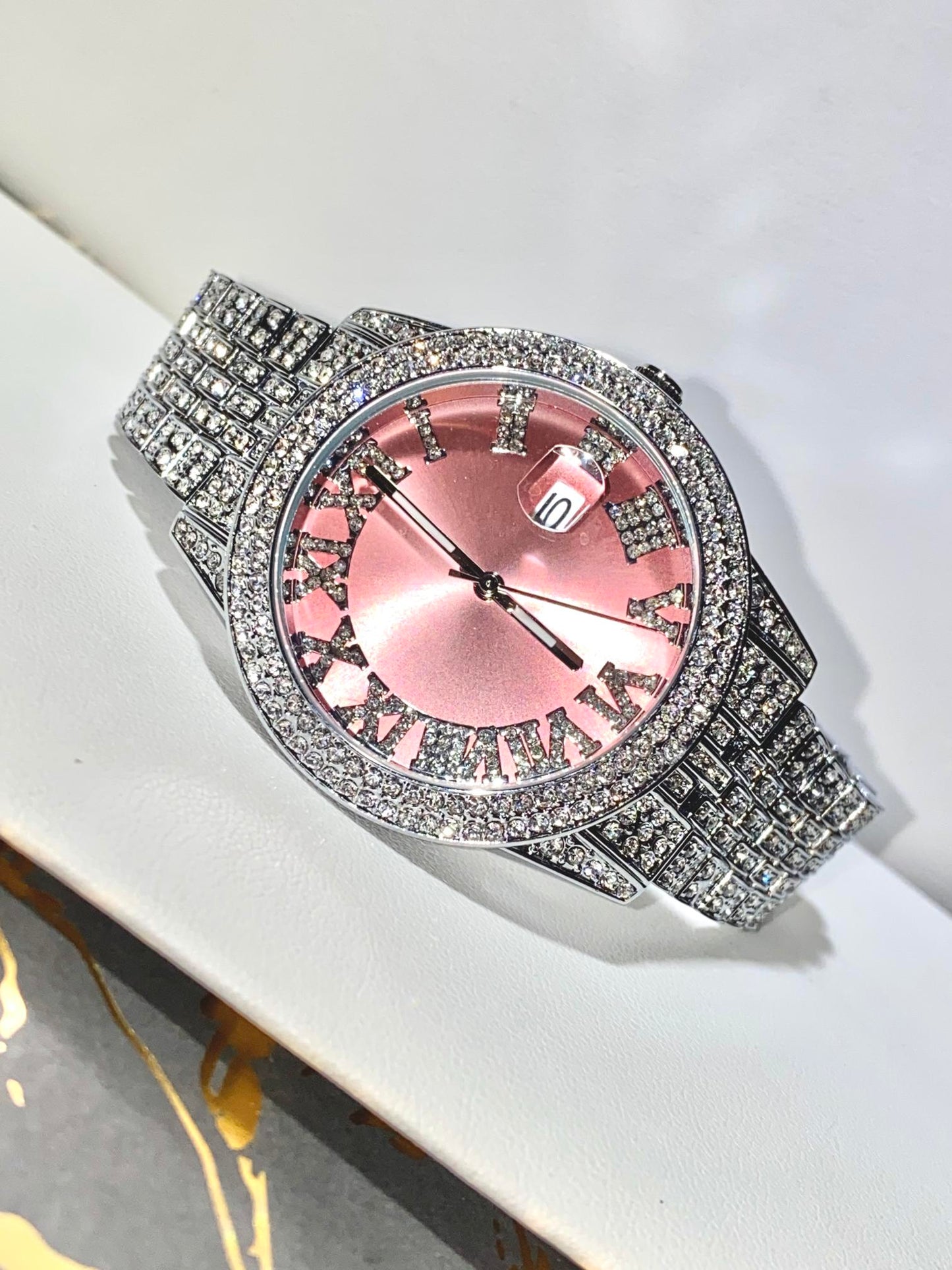Rose gold Roman numeral iced watch with silver strap on white background – Rosé Royale 38MM by Time Flex