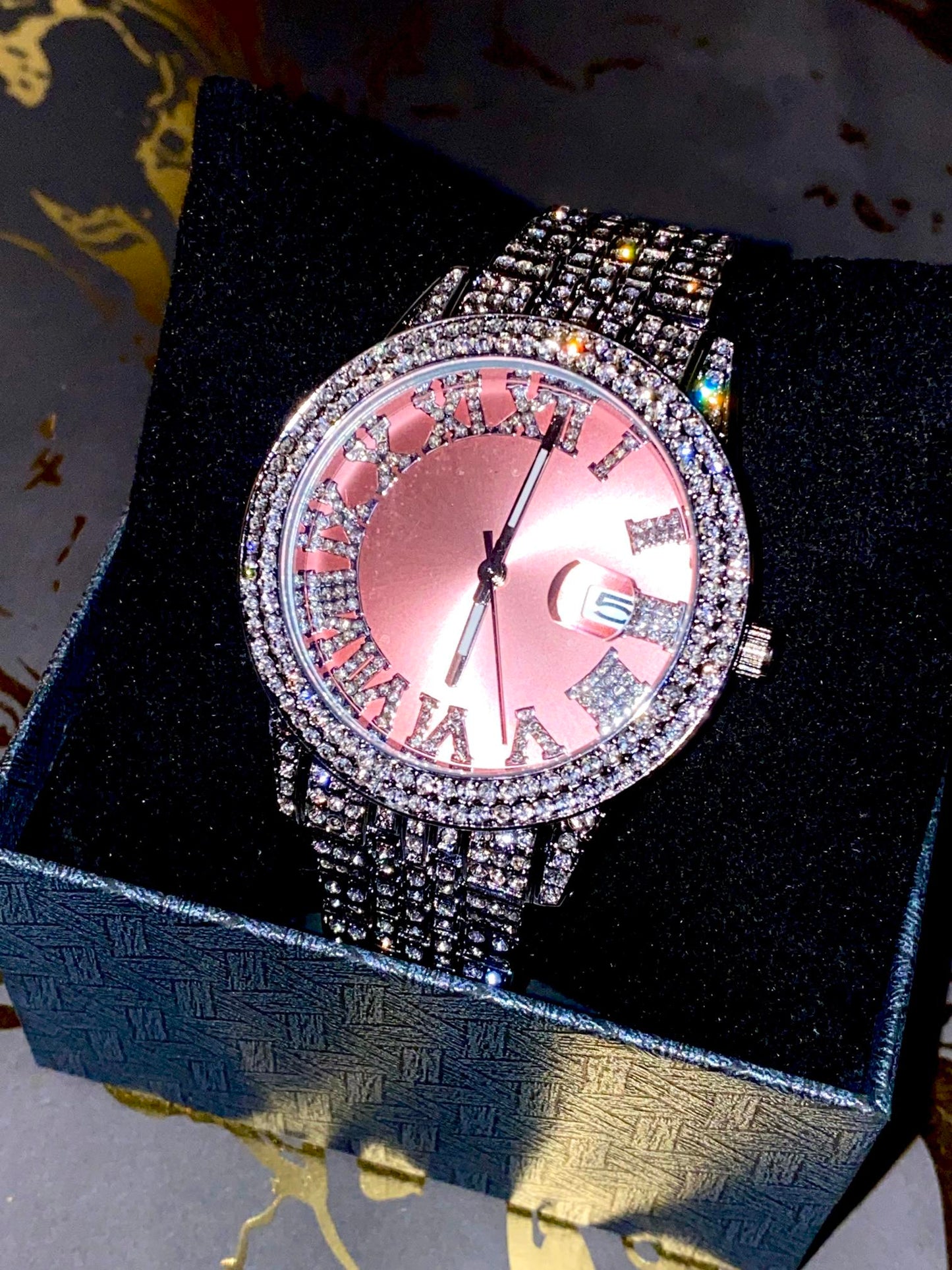 Rose gold Roman numeral iced watch with silver strap on white background – Rosé Royale 38MM by Time Flex