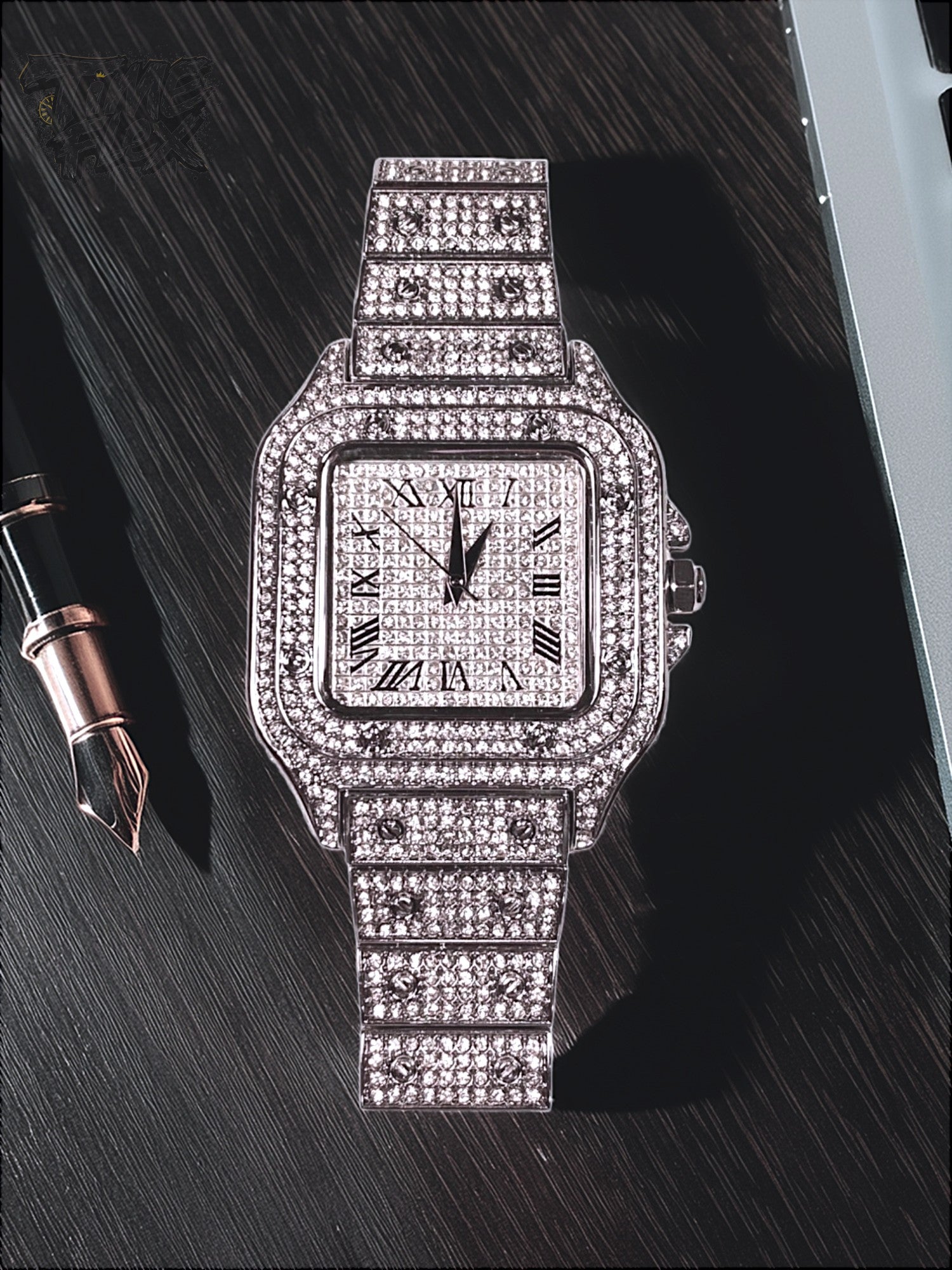 Silver-tone unisex watch with a square dial, crystal-encrusted bezel, and sparkling band. The watch features Roman numeral markers and a luxurious, diamond-studded design, offering a sleek and elegant look.