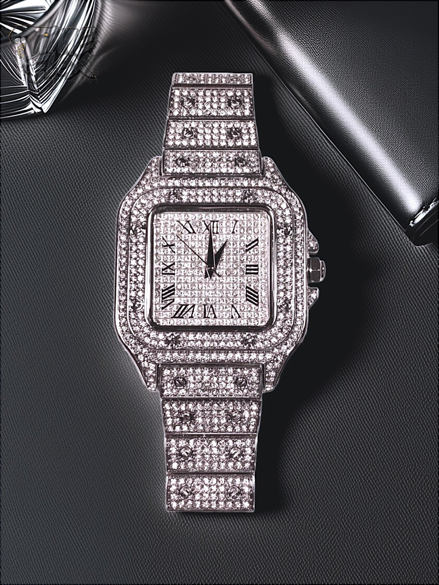 Silver-tone unisex watch with a square dial, crystal-encrusted bezel, and sparkling band. The watch features Roman numeral markers and a luxurious, diamond-studded design, offering a sleek and elegant look.