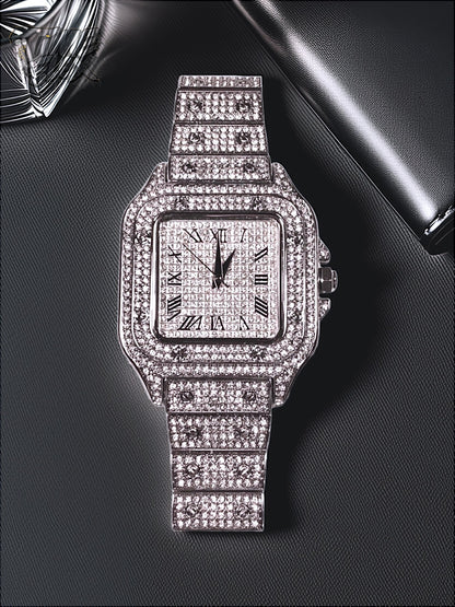 Silver-tone unisex watch with a square dial, crystal-encrusted bezel, and sparkling band. The watch features Roman numeral markers and a luxurious, diamond-studded design, offering a sleek and elegant look.