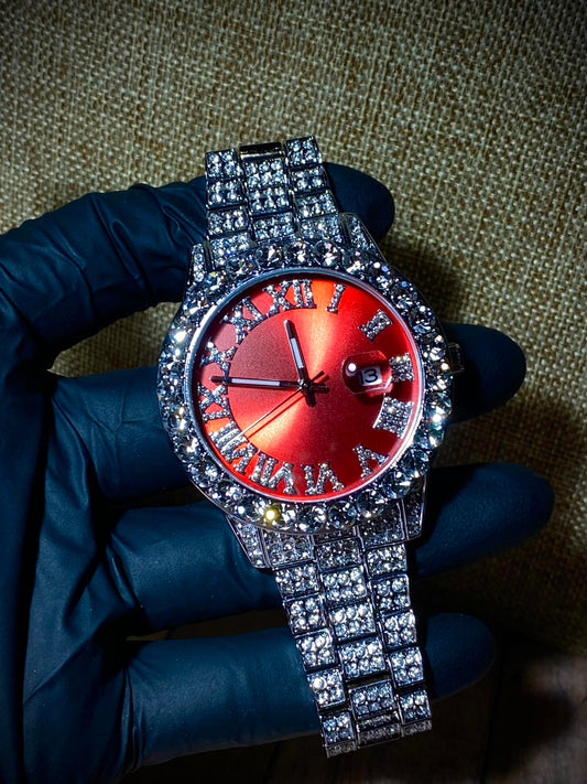Red dial Roman numeral iced-out watch with crystal bezel and silver pavé band – luxury statement accessory