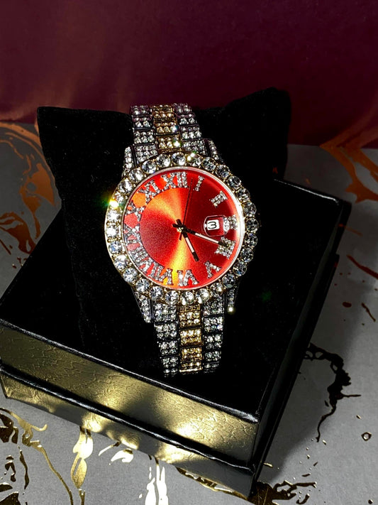 Two-tone iced-out watch with red dial, Roman numerals, and diamond bracelet – luxury streetwear timepiece